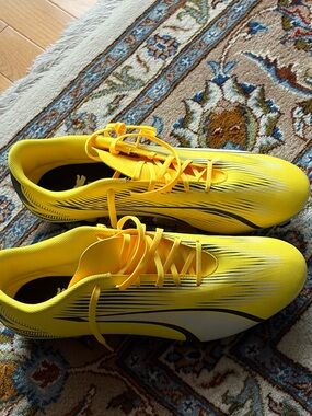 Puma Men’s Bright Yellow Athletic Soccer Cleats with Black Accents